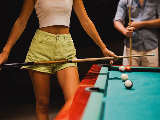 a person playing pool
