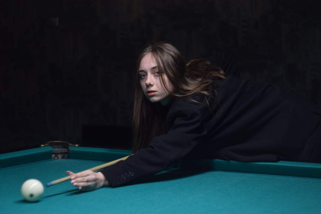 a person playing pool