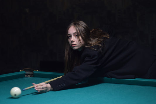 a person playing pool